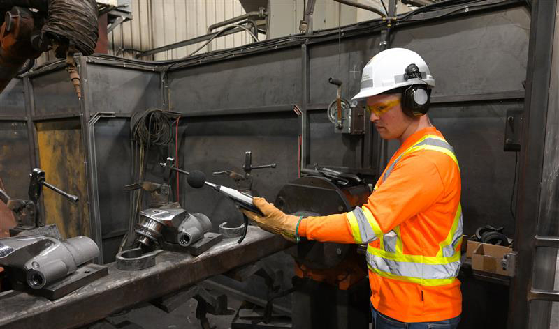 Worker conducting tests