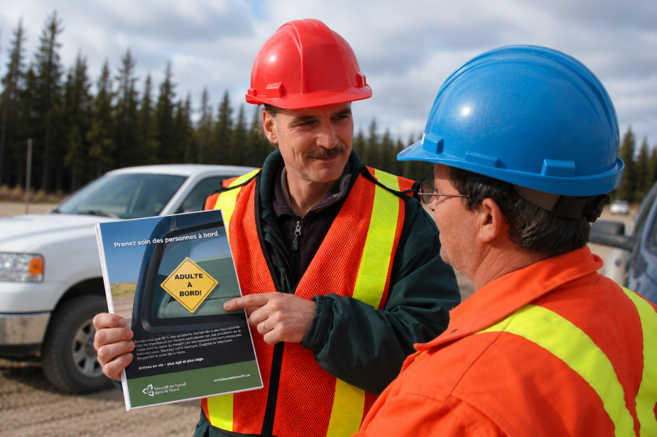 Workers discussing French safe driving poster