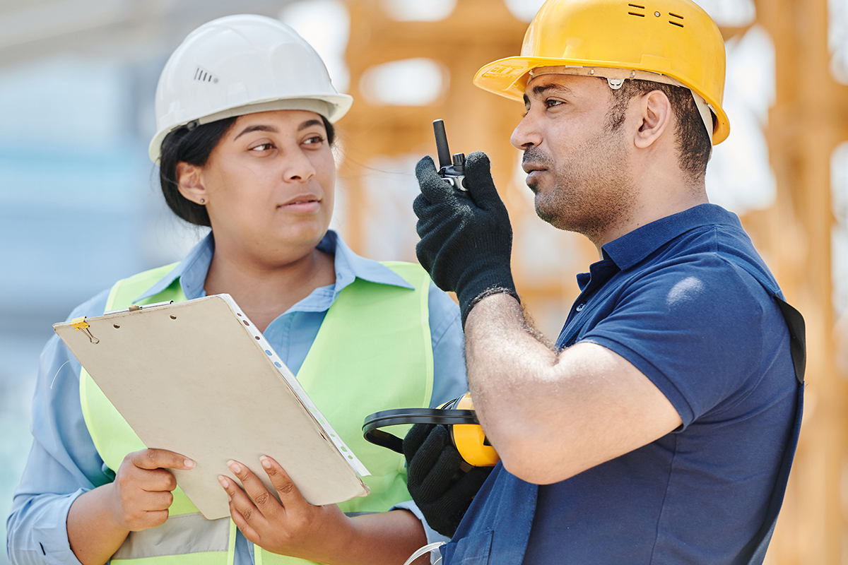 Two workers talking