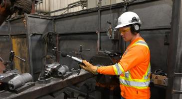 Worker conducting tests